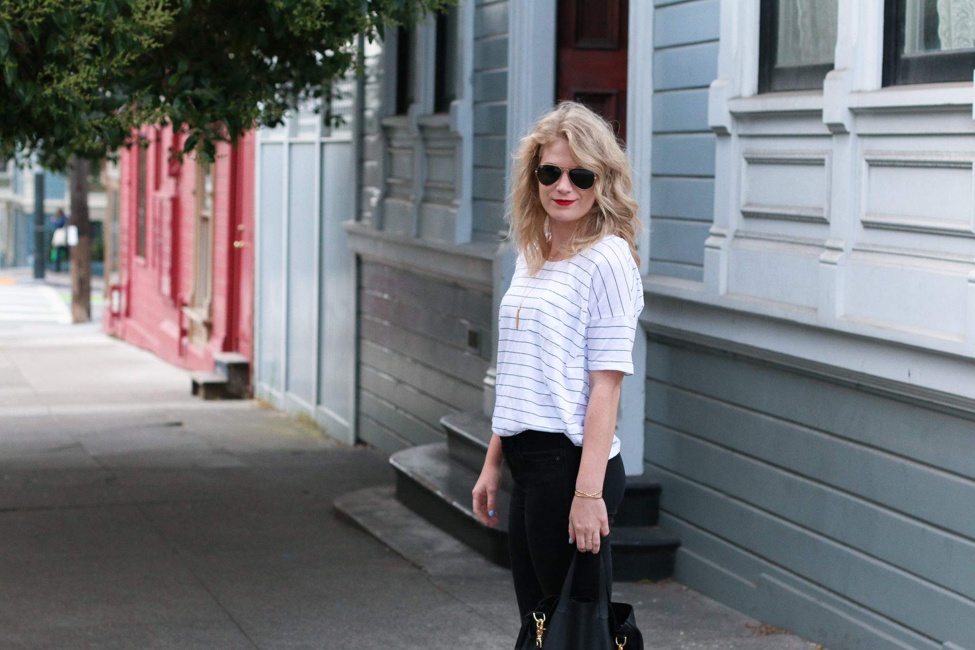 Black & White Tee with Skinny Jeans & Lace Up Flats.