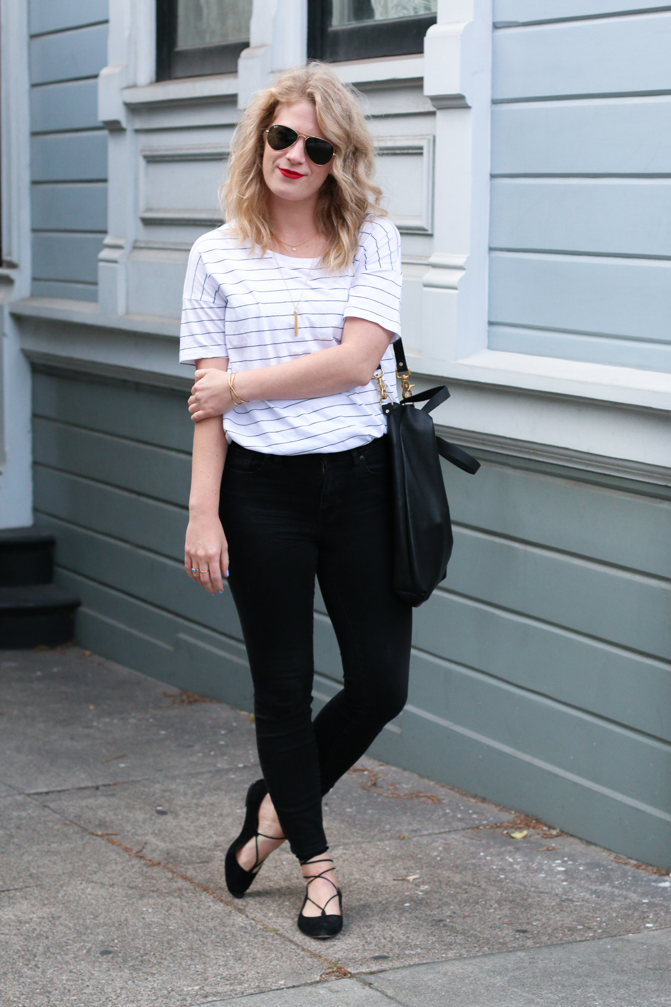 Black & White Tee with Skinny Jeans & Lace Up Flats.